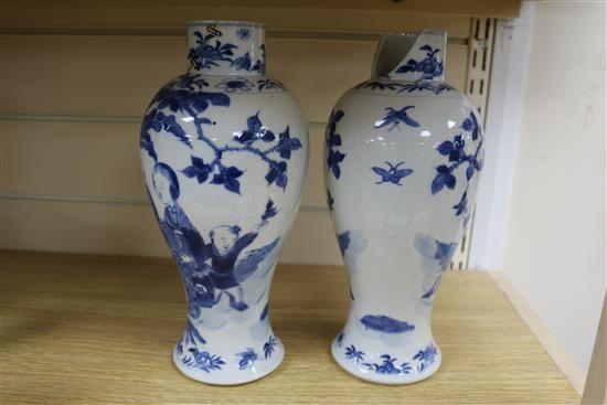 Two Chinese blue and white vases and covers